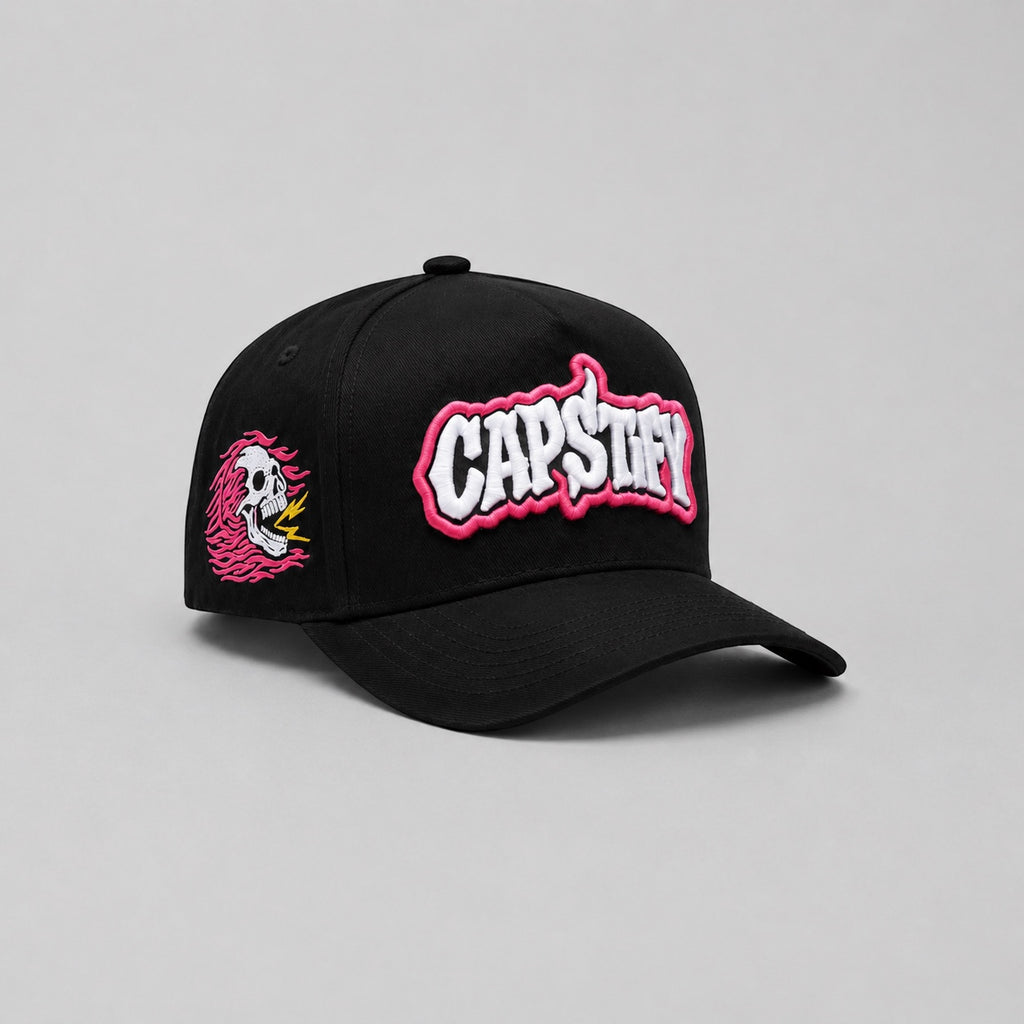 Black Capstify Skull Voltage A-Frame cap with pink 3D puff embroidery and flaming skull side patch.
