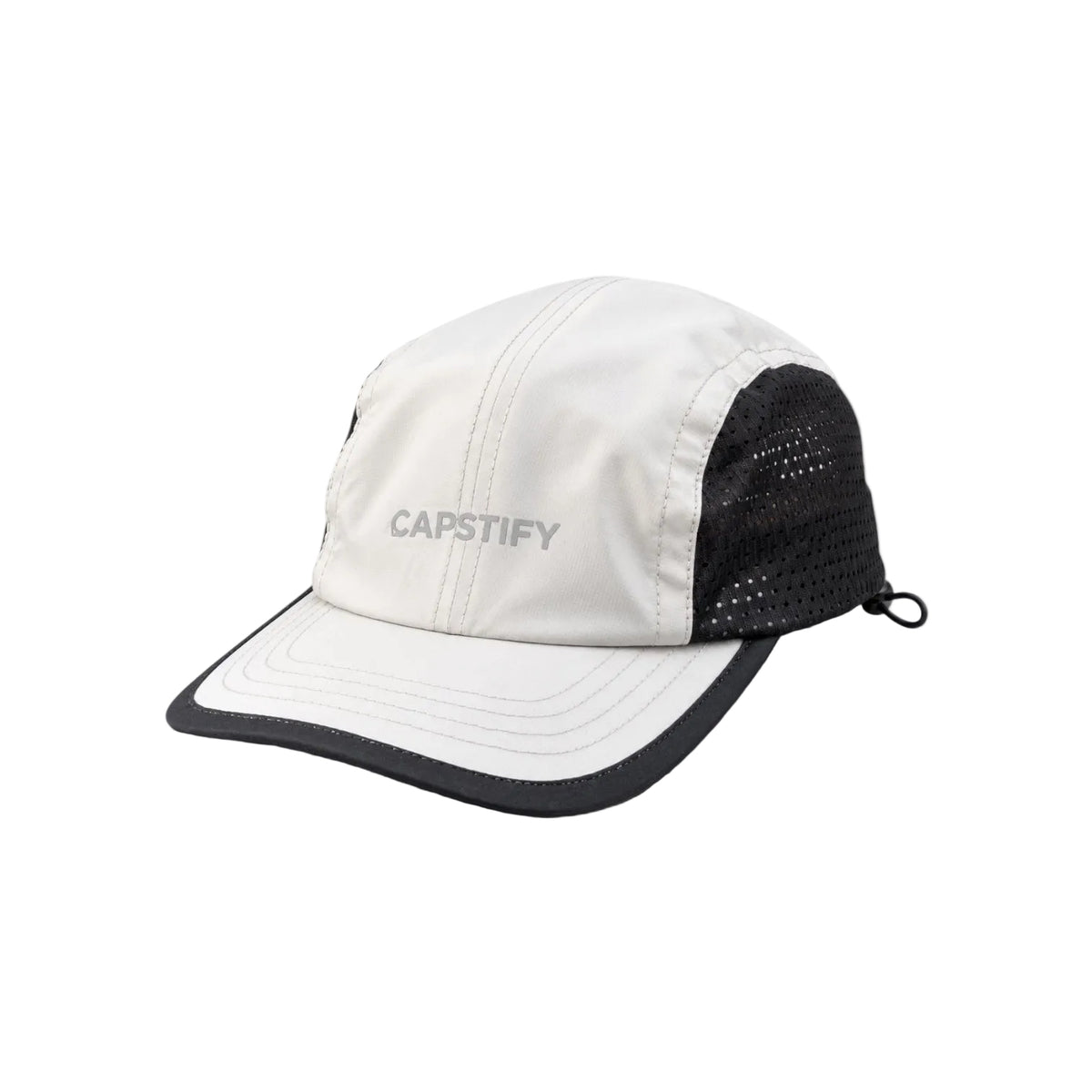 A white and black baseball cap with a structured white front panel, black mesh back, and black brim, featuring the CAPSTIFY brand name embroidered on the front.