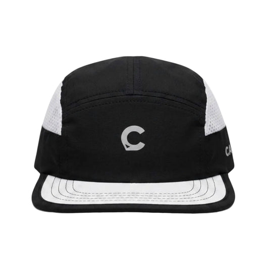 A black 5-panel camp cap with white mesh side panels and a white curved brim, featuring a gray embroidered logo on the front.