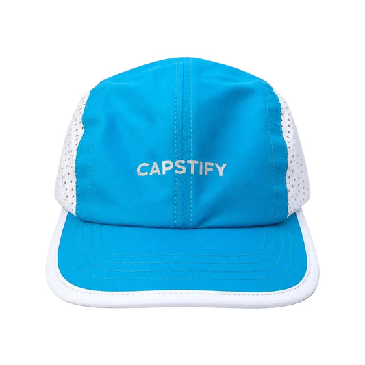 A bright blue and white 5-panel cap with 'CAPSTIFY' embroidered in white on the front panel, shown against a plain white background.
